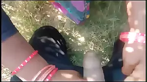 A young Indian beauty fills her tight pussy with cum in the fresh air