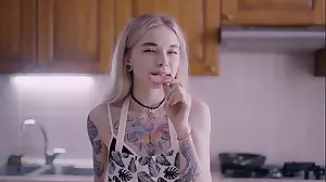 Blonde teen with pierced nipples heats up the kitchen