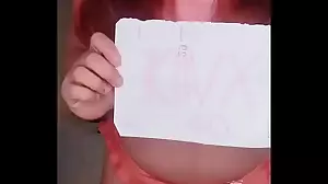 Redhead novice showcases her assets in a verification video